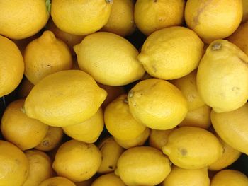 Full frame shot of lemons at market stall