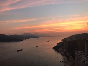 Scenic view of beach against sky during sunset