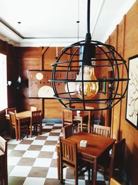 Empty chairs and table in restaurant