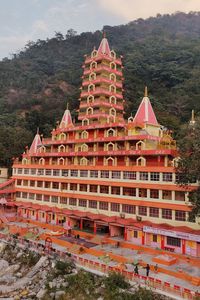 View of temple against building