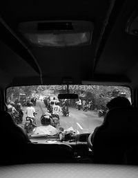 People sitting in car