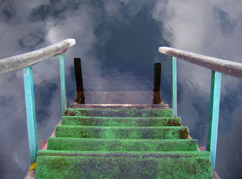 High angle view of steps by lake