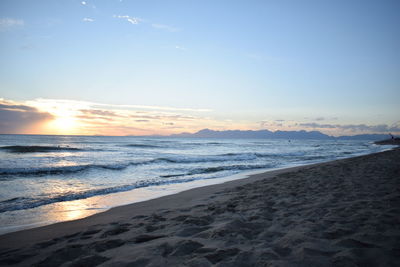 Scenic view of sea at sunset