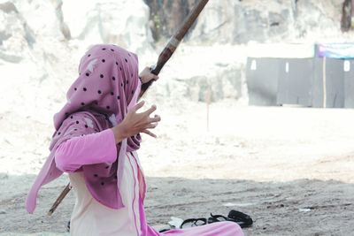 Woman practicing with archery