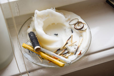 High angle view of eggs in plate on table