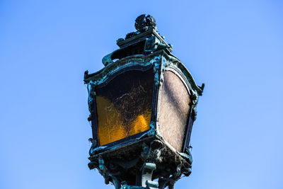 Low angle view of built structure against blue sky