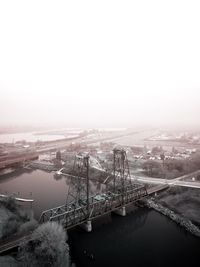 High angle view of bridge over river against clear sky