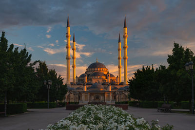 View of temple building against sky during sunset