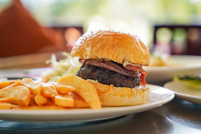 Close-up of burger in plate on table