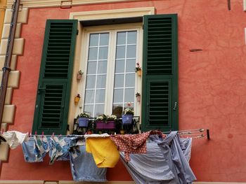 Clothes drying against building