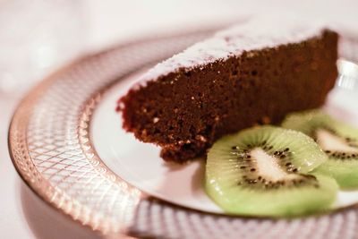 Close-up of sweet food with kiwi in plate