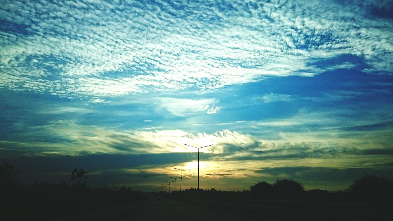 sky, tranquil scene, silhouette, scenics, cloud - sky, tranquility, beauty in nature, sunset, nature, cloud, cloudy, idyllic, water, blue, sea, flying, dusk, outdoors, horizon over water, no people