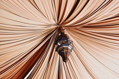 Low angle view of textile ceiling