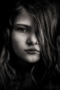 Close-up portrait of serious teenage girl