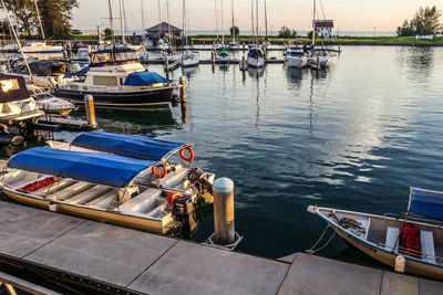 Boats moored at harbor