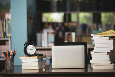 Stack of books on table