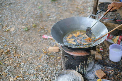 Midsection of person preparing food