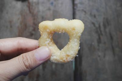 Close-up of hand holding ice cream