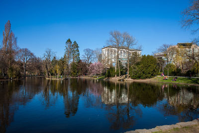 Scenic view of lake against blue sky
