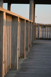 Pier amidst buildings against sky