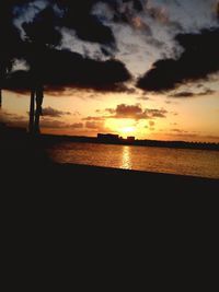 Scenic view of sea at sunset