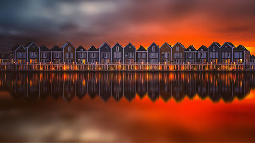 Scenic view of sea against orange sky