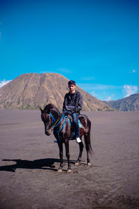 Man riding horse