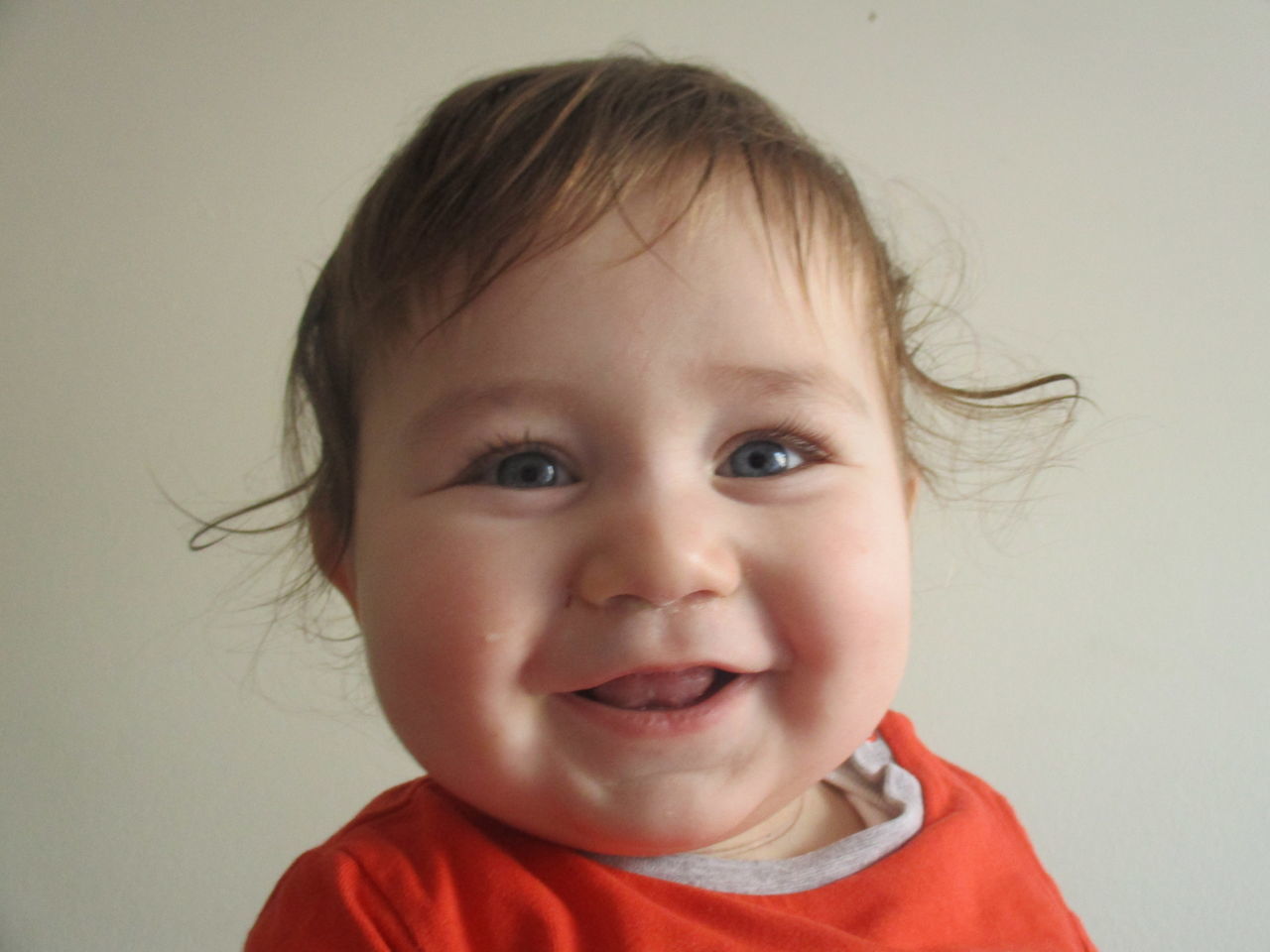 headshot, portrait, studio shot, childhood, child, cute, innocence, close-up, looking at camera, human face, one person, smiling, real people, baby, happiness, indoors, human body part, cheerful, people, white background, babies only, day