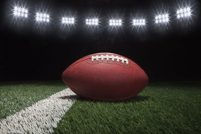 Close-up of golf ball on field