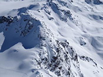 Scenic view of snow covered mountains