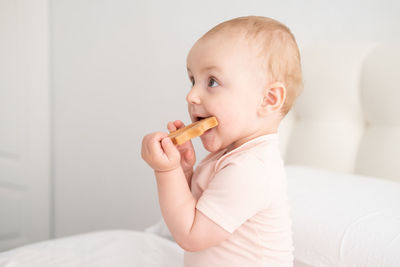 Close-up of cute girl with eyes closed