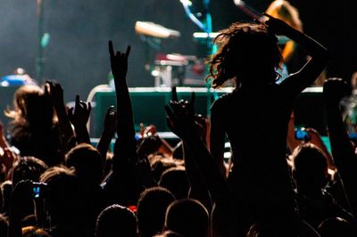 People enjoying at music concert