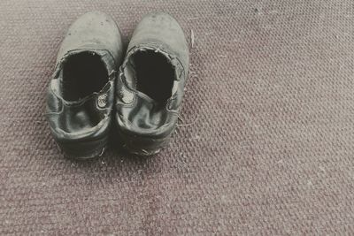 High angle view of shoes on rug