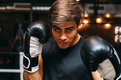 Portrait of man boxing in ring