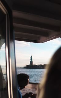 Statue of liberty seen from boat