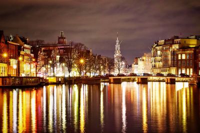 Illuminated buildings at waterfront