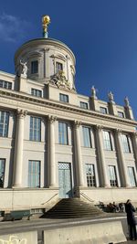 Low angle view of altes rathaus against blue sky