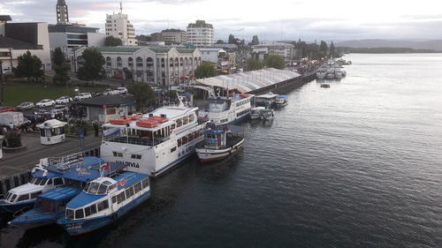 High angle view of boats moored in sea against sky