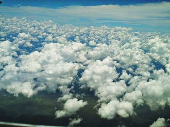 Scenic view of landscape against cloudy sky