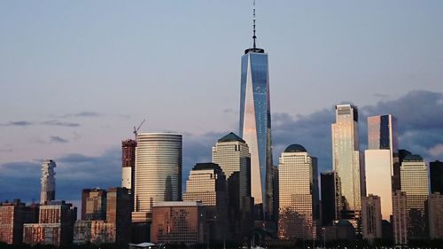 Skyscrapers in city against sky