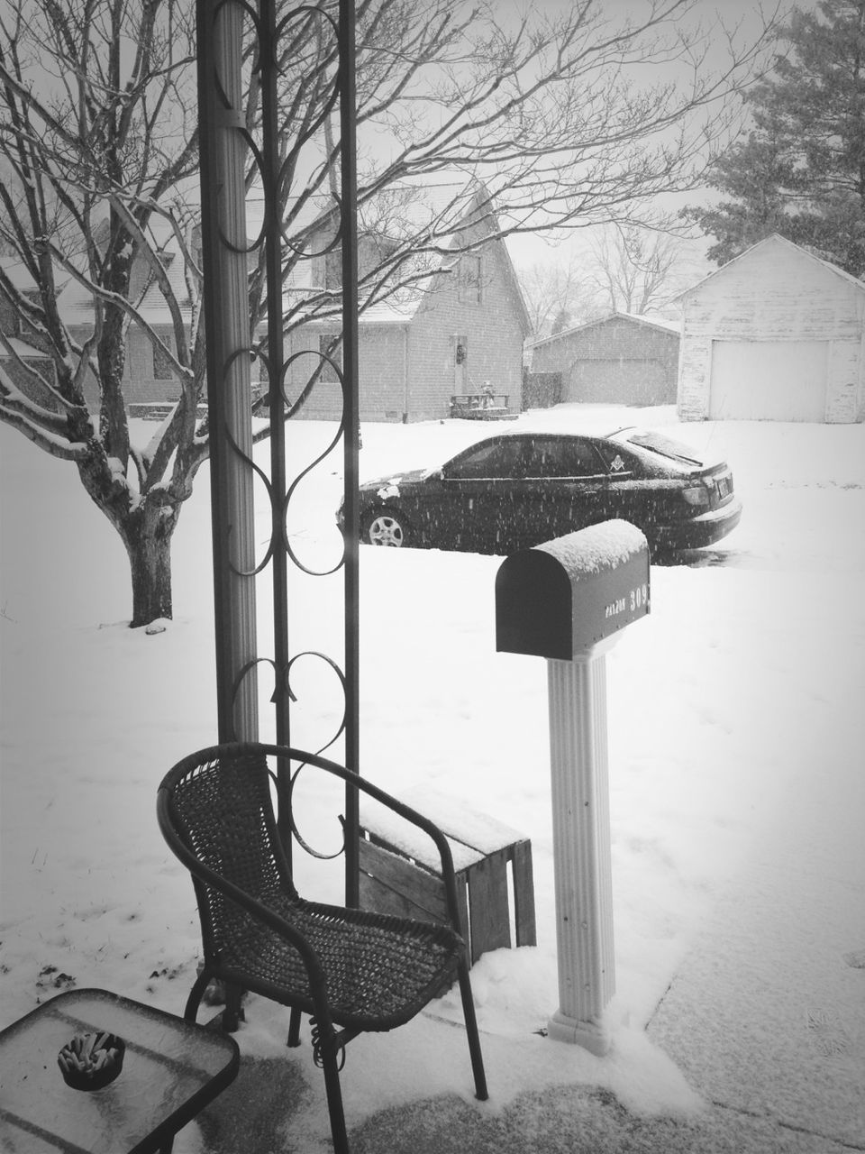 architecture, built structure, building exterior, tree, empty, chair, absence, city, day, shadow, bench, sunlight, no people, bare tree, street light, outdoors, branch, clear sky, tower, table