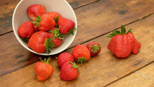 High angle view of strawberries on table