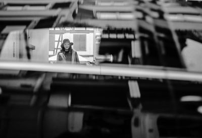 Close-up of man in front of building