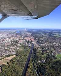 Aerial view of cityscape against sky