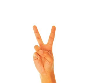 Close-up of human hand against white background