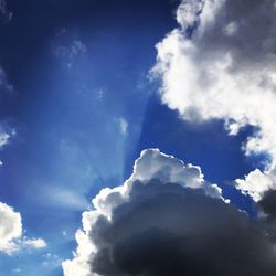 Low angle view of clouds in blue sky