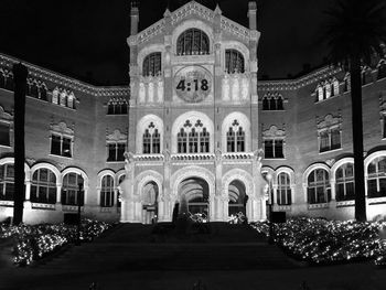 Facade of historic building at night