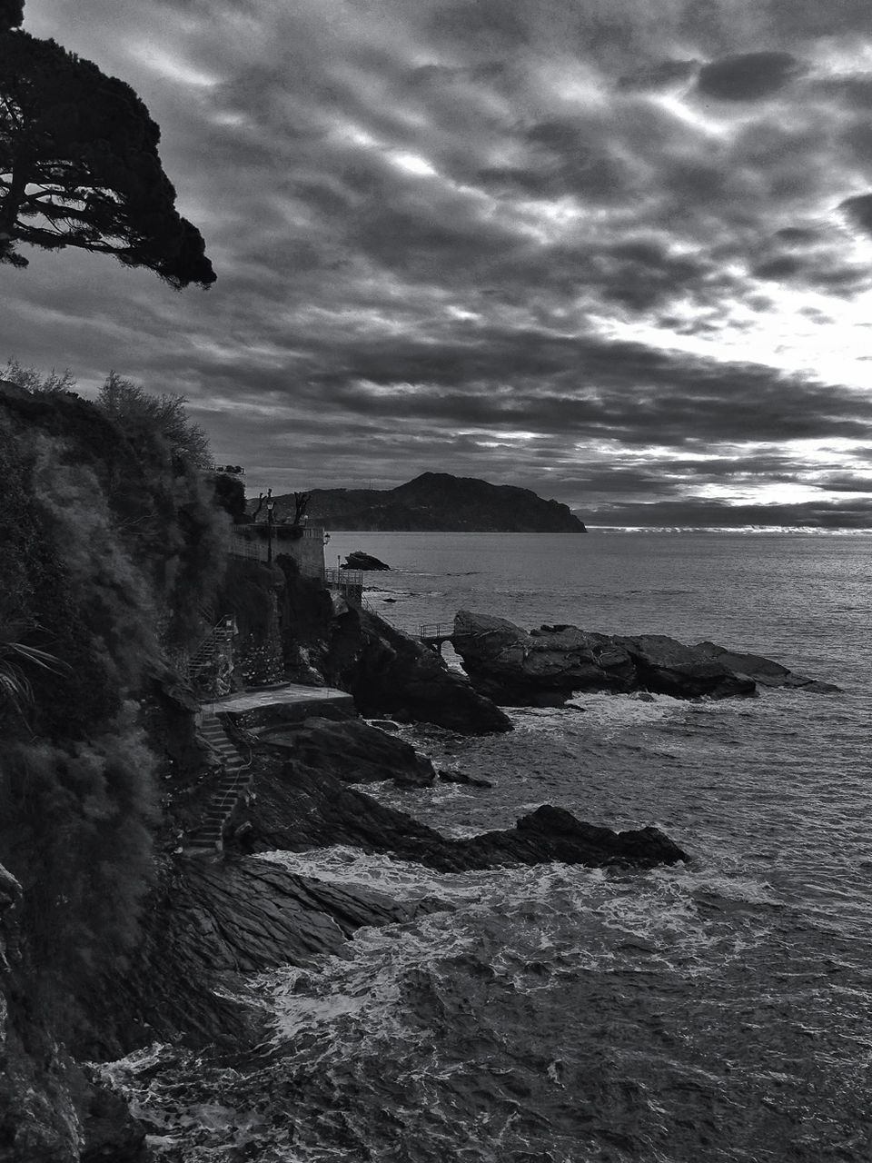 sky, water, sea, cloud - sky, tranquil scene, cloudy, tranquility, scenics, horizon over water, beauty in nature, nature, cloud, beach, rock - object, overcast, idyllic, shore, waterfront, weather, rippled