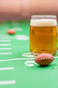 Close-up of beer glass on table