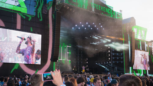 Group of people looking at music concert